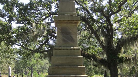 Stone Monument surrounded by black fence