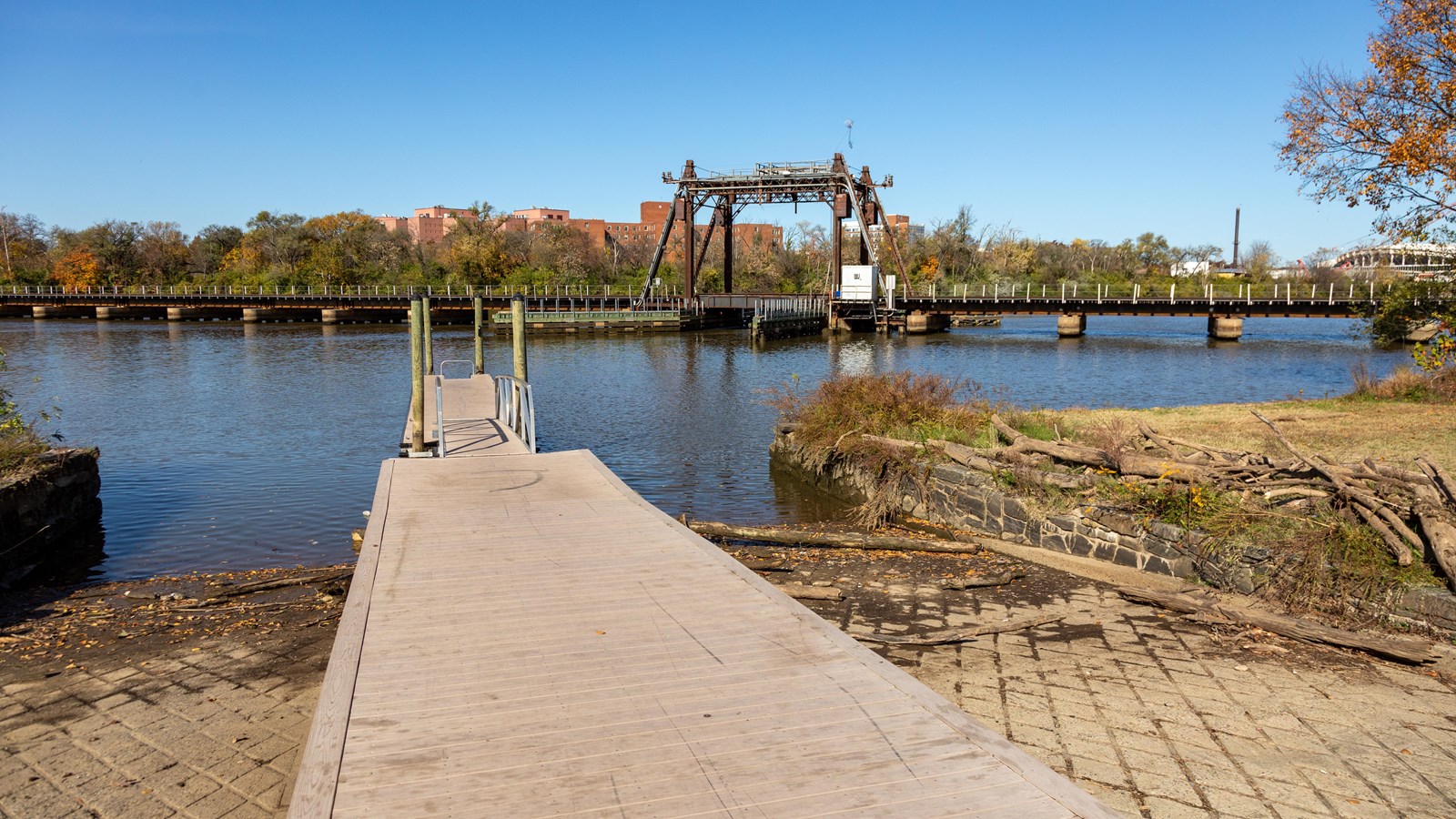 A boat ramp leads into the Anacostia river