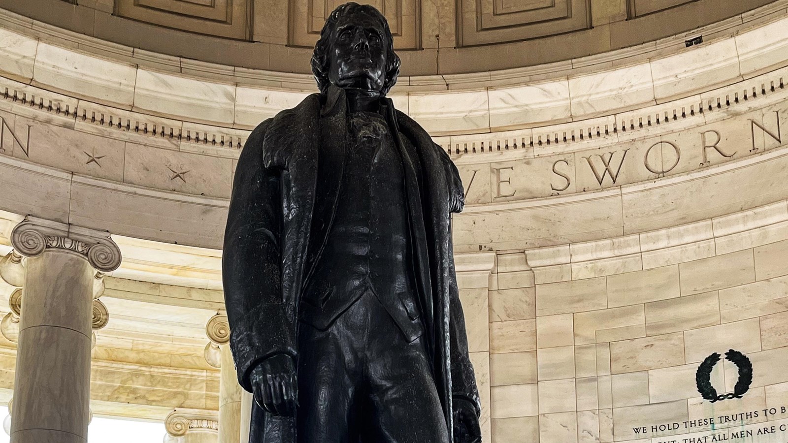 Brown colored statue of a man