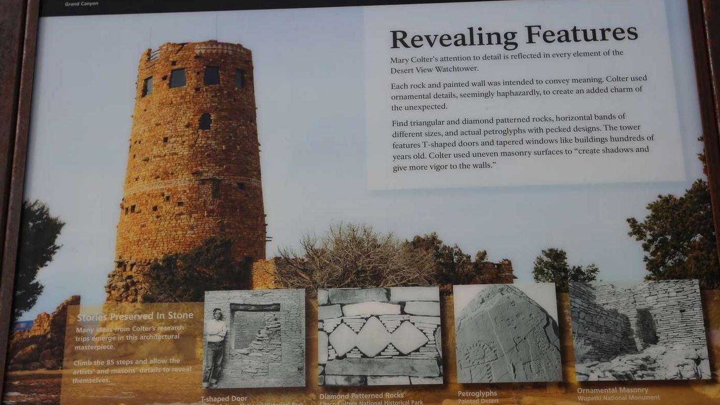 A wayside with a picture of the watchtower and text