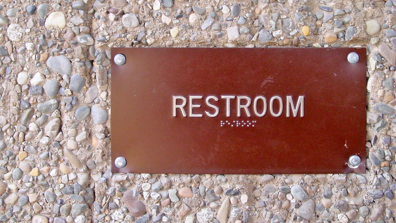 Brown metal sign 