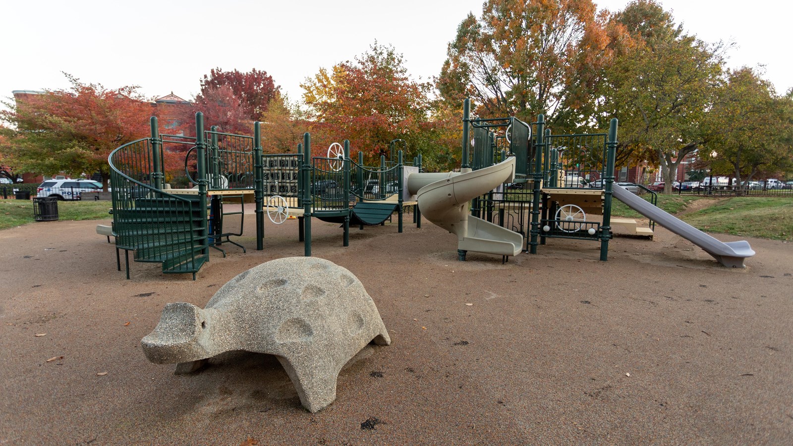 A play structure with slides.