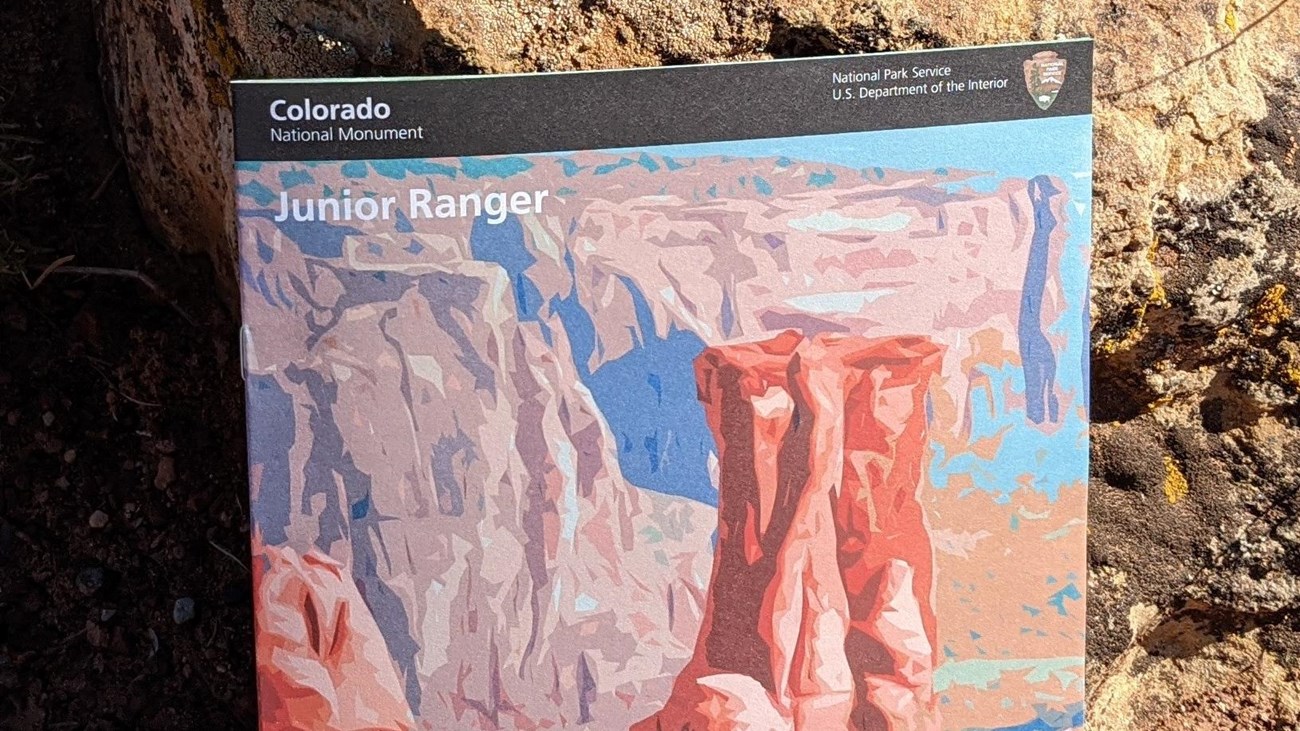 colorful booklet with illustrations of canyon sandstone towers