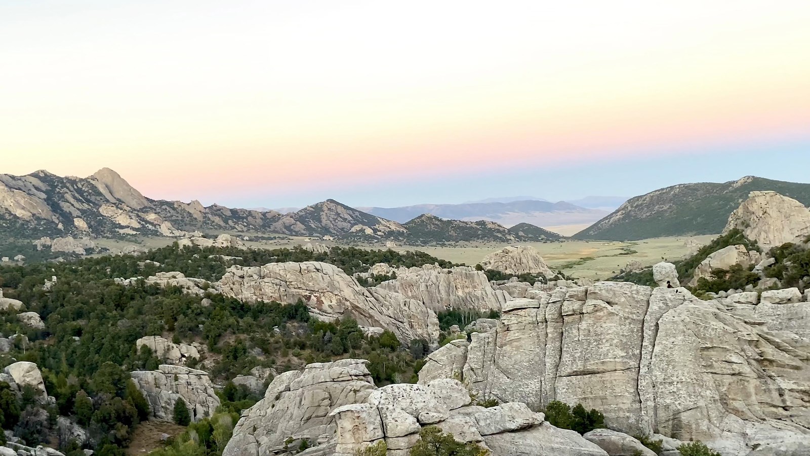 Spectacular scenic view of mountains and granite formations at dusk.
