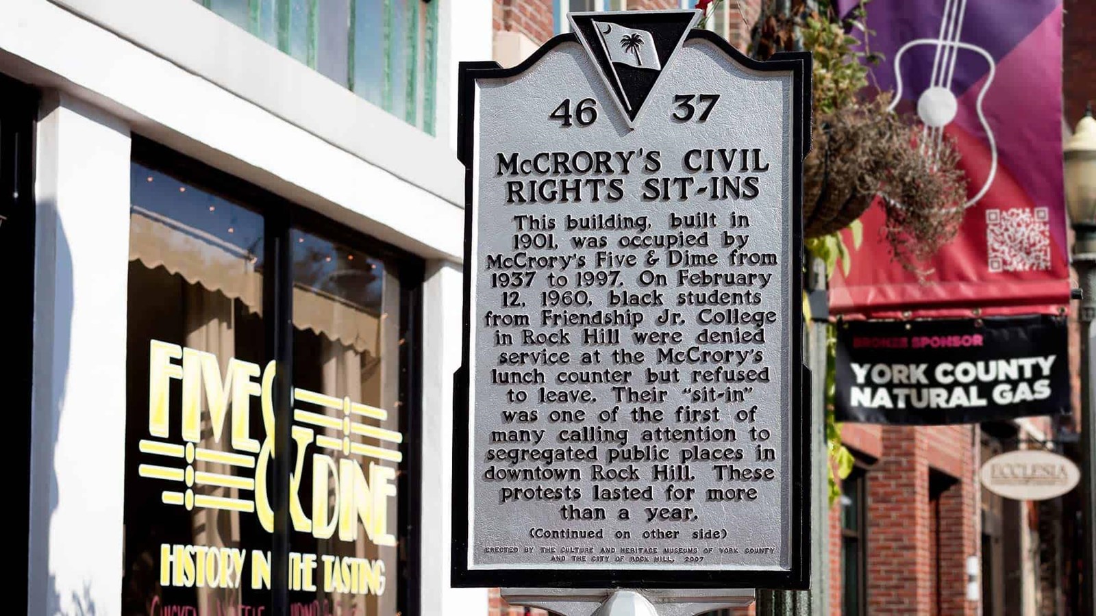 Color image of historical marker for McCrory\'s Five and Dime