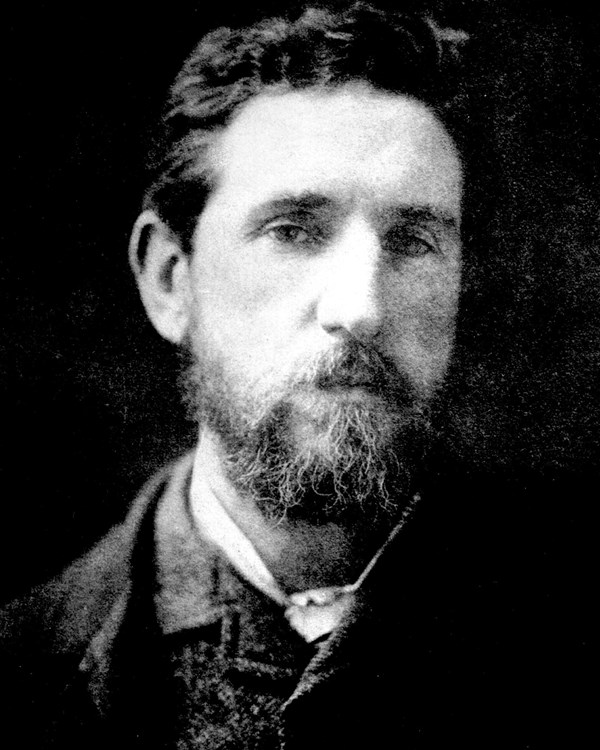 Black and white photograph of Augustus Saint-Gaudens in his early thirties.
