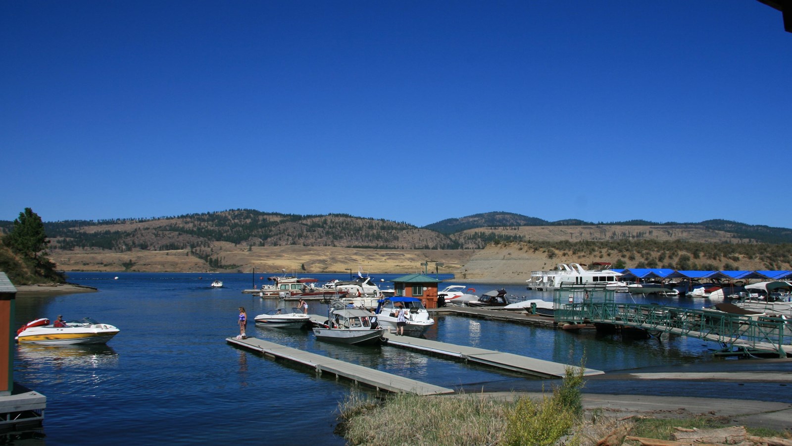 The paved boat launch has two floating docks adjacent to the marina.