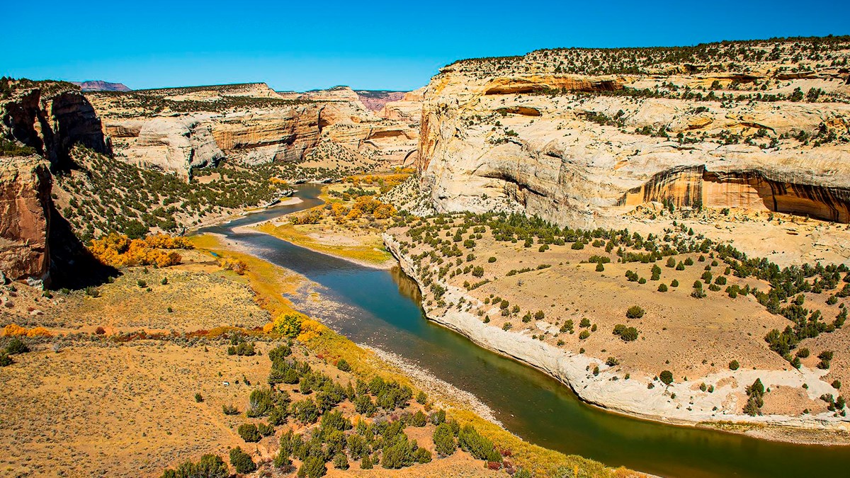 The Yampa River flows through Dinosaur\'s rugged sandstone canyons.