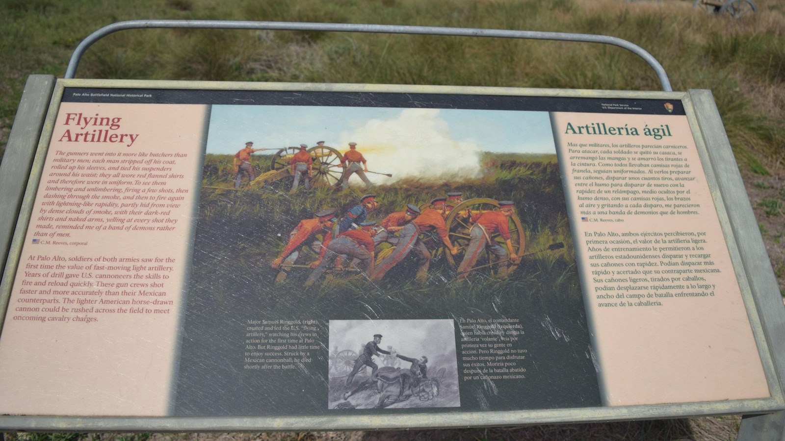 A low-profile wayside base in grey weathering steel for a 36”x 24” interpretation panel.