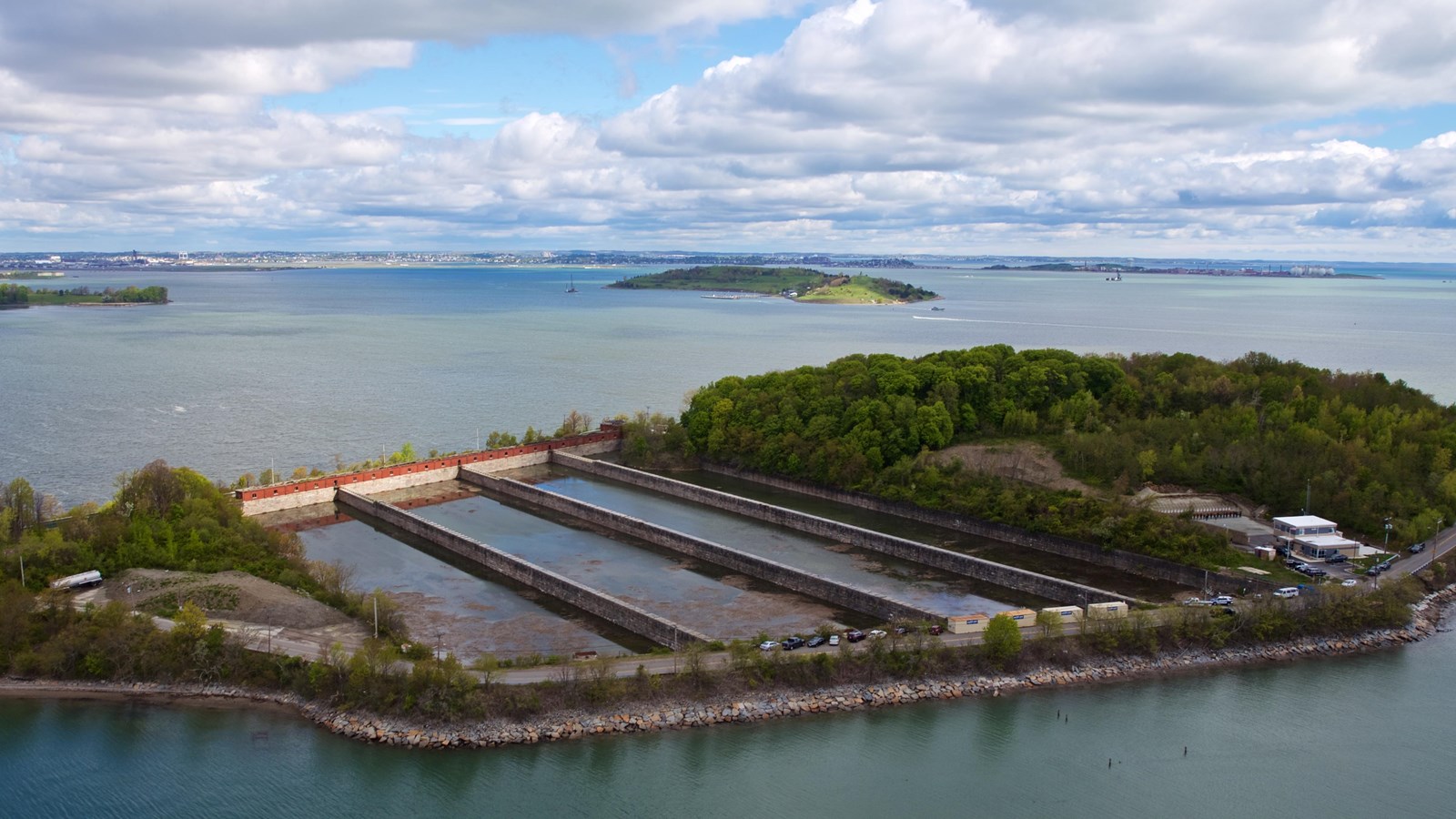 Ariel view of Moon Island with tress surrounding a stone and metal structure