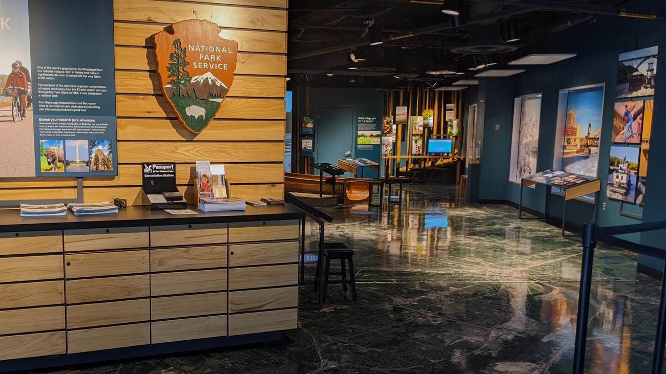 Lobby area with maps and desk. 