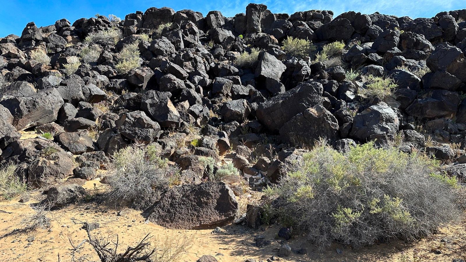 A field of boulders along a volcanic escarpment.