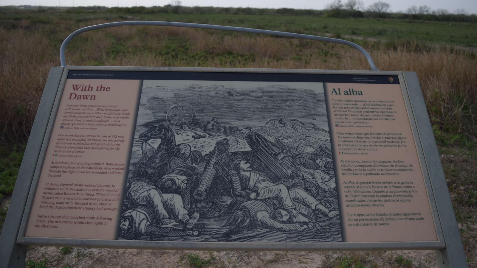 A low-profile wayside base in grey weathering steel for a 36”x 24” interpretation panel. 