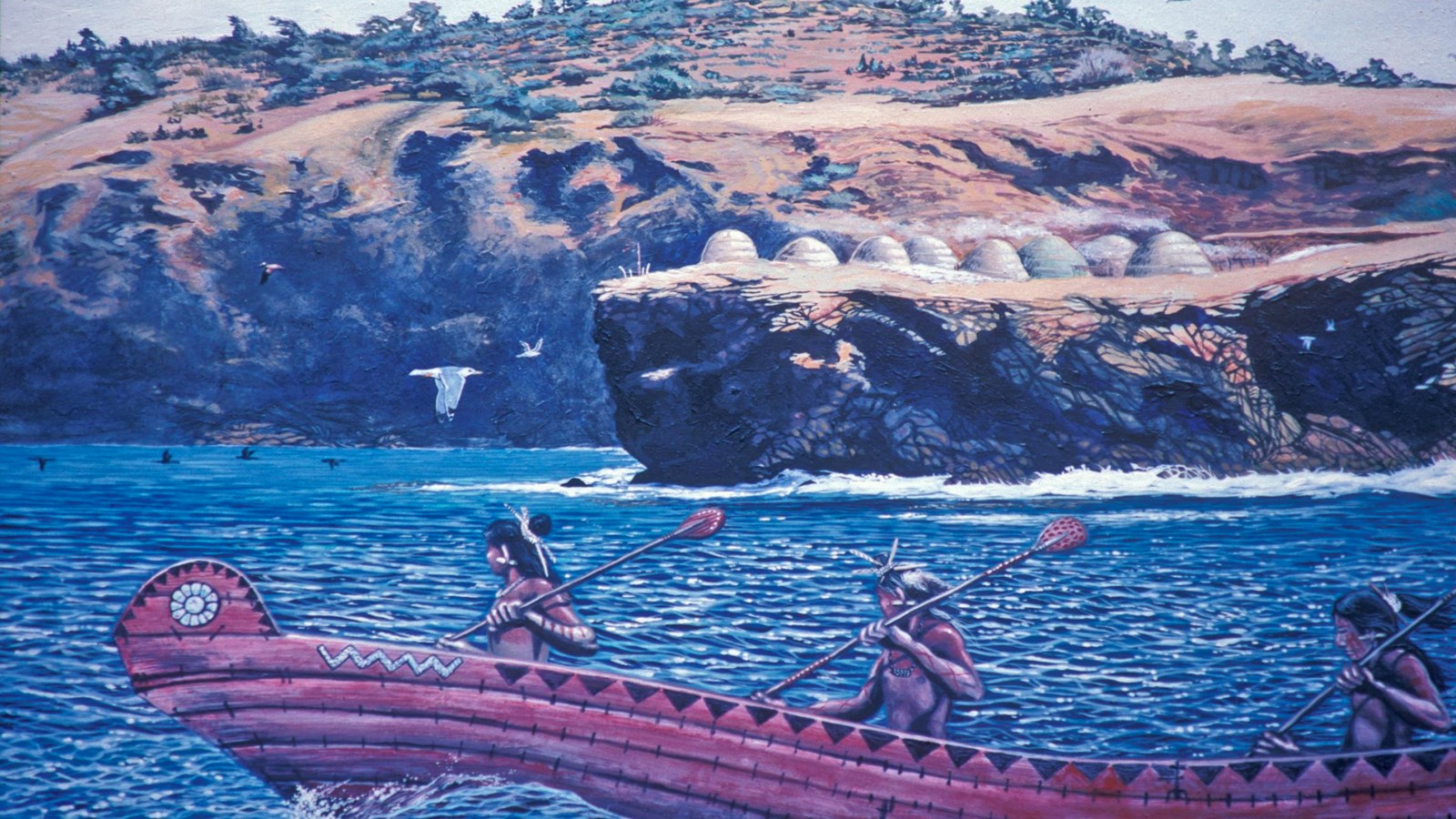 Chumash paddling a canoe off the coast of a village site. 