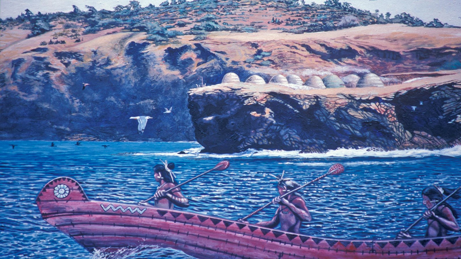 Chumash paddling a canoe off the coast of a village site.
