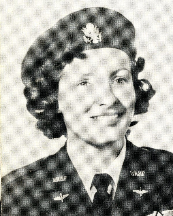Black and white headshot of woman in uniform