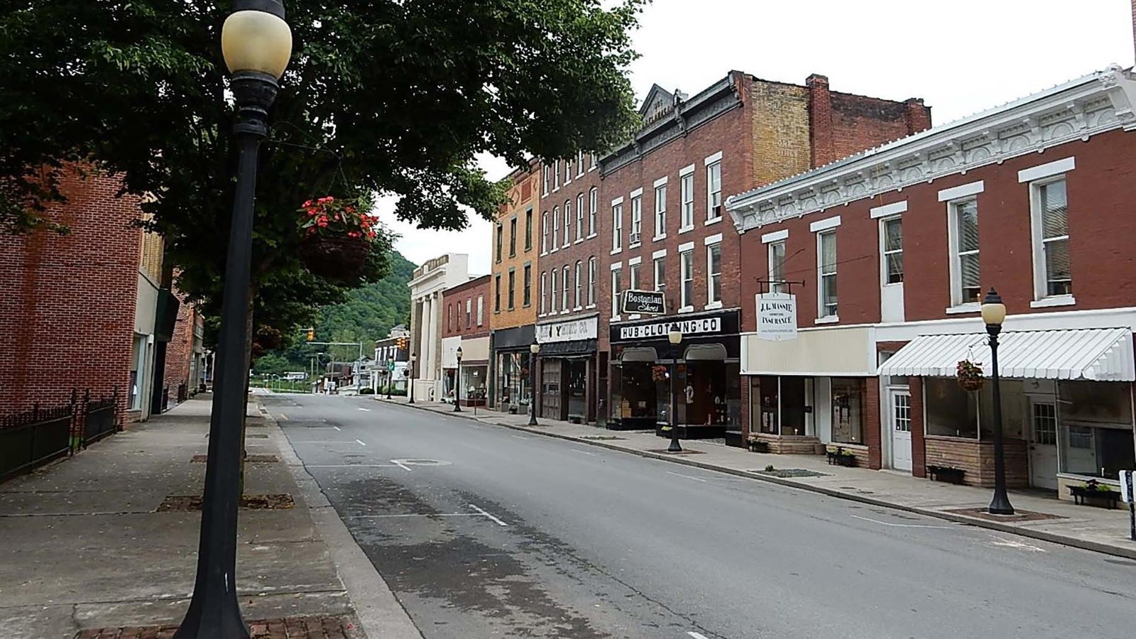 brick buildings along a main street through an old town