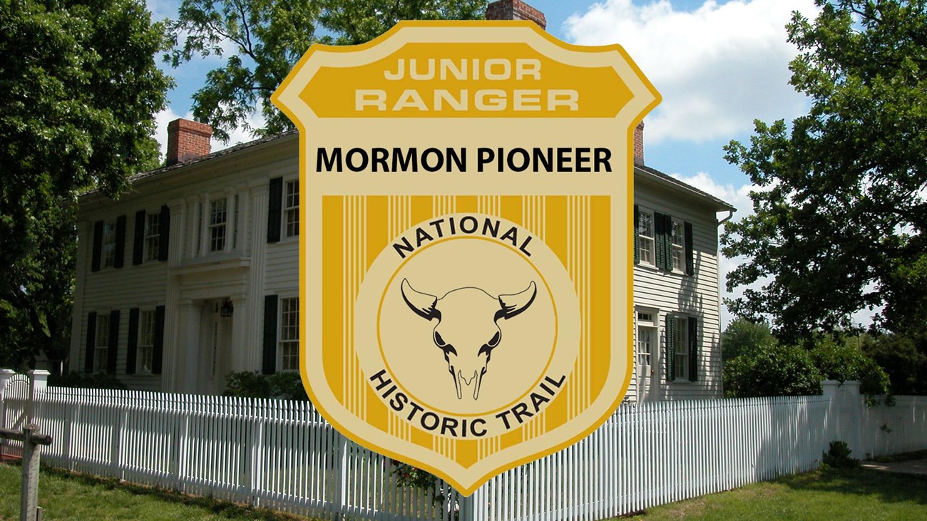 a junior ranger badge over an image of a large, white, colonial style historic home. 