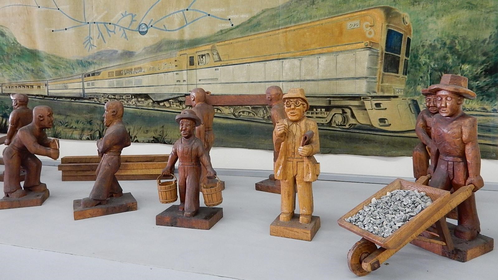 figures of railroad workers on display in a museum