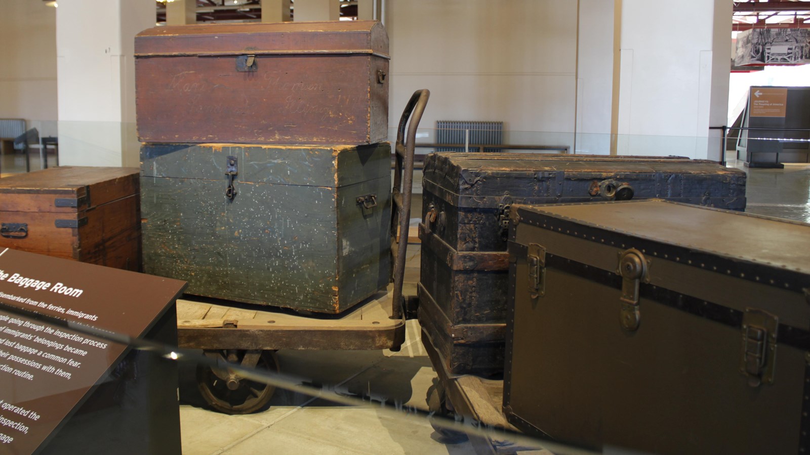 Hard sided travel trunks on wheeled carts
