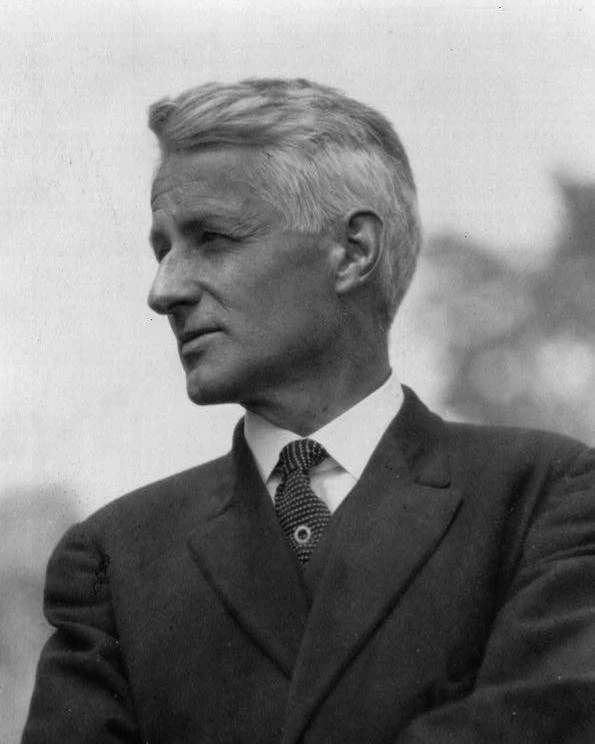 black and white photo of man in suit