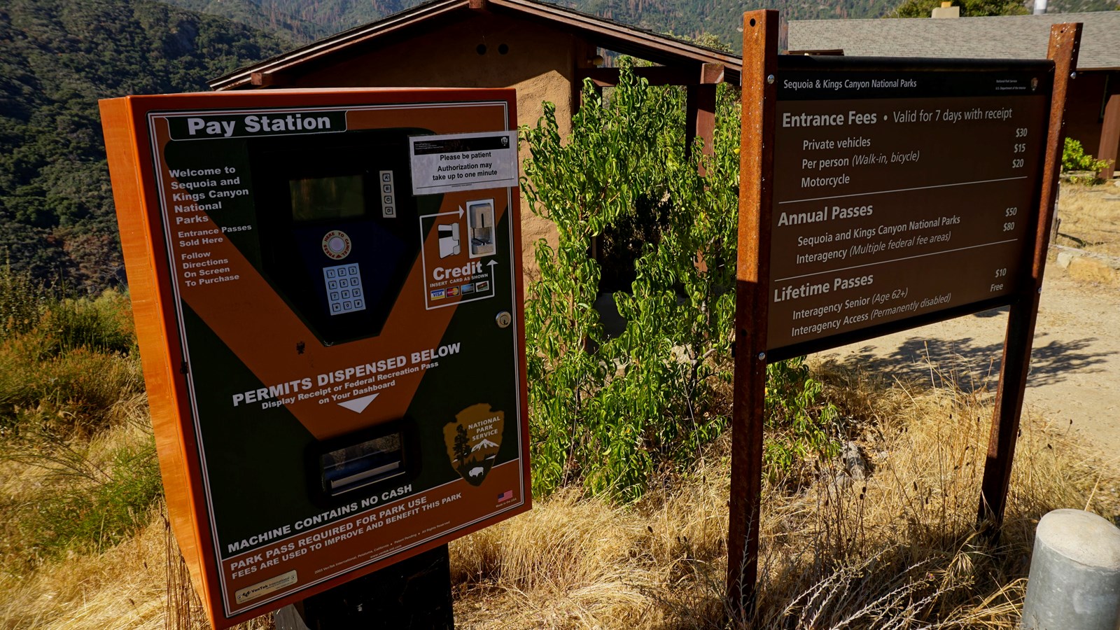 A metal box collects money to distribute passes