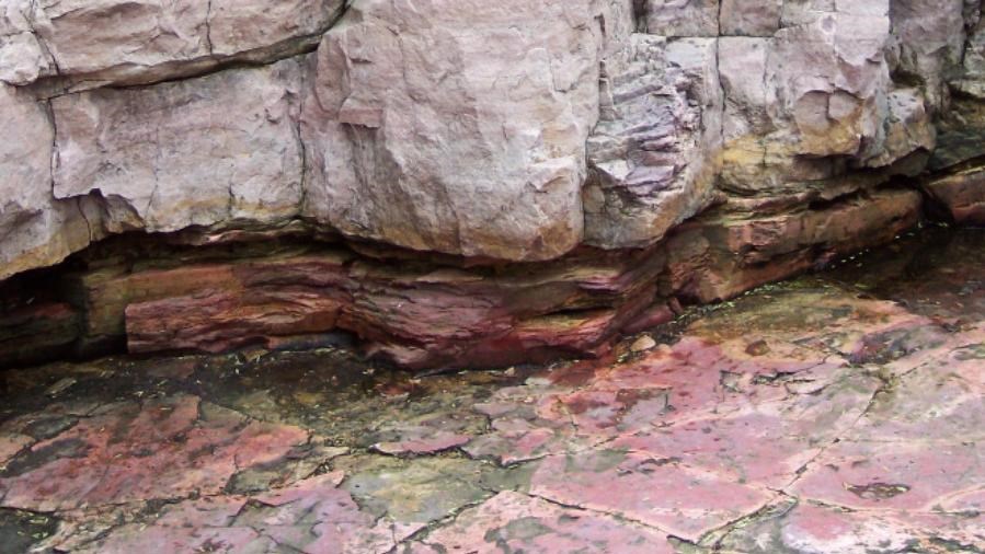 A quarry wall displaying the quartzite and pipestone