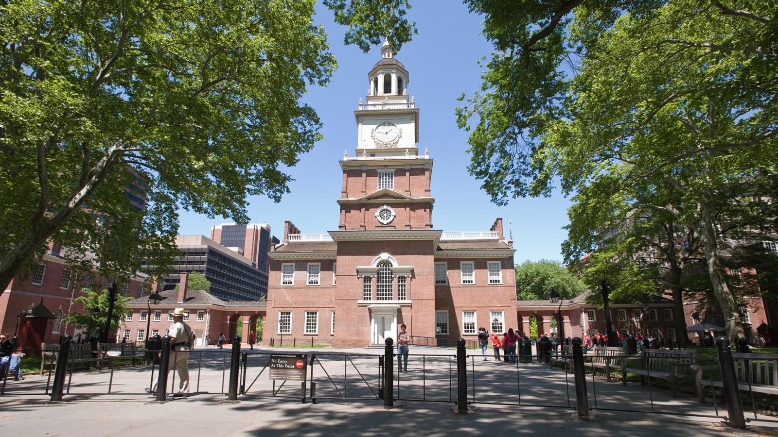 Exterior view of south facade of Independence Hall, with iconic clock tower and steeple.