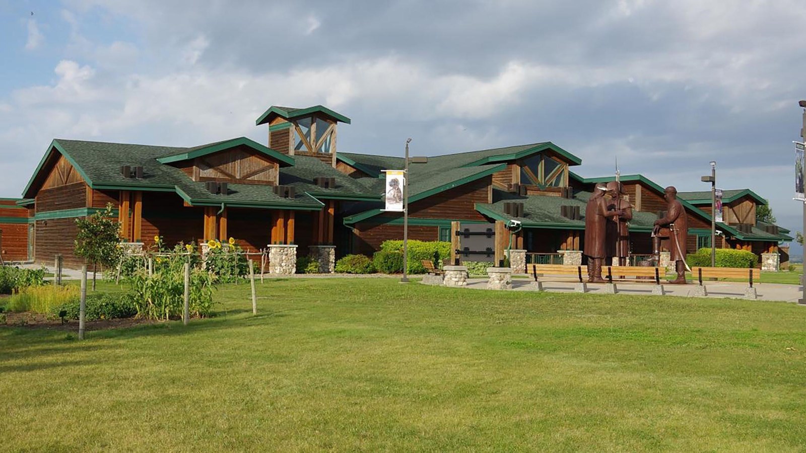 large visitor center building with green roof