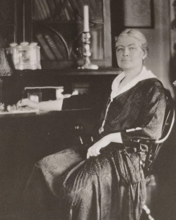 woman seated at desk