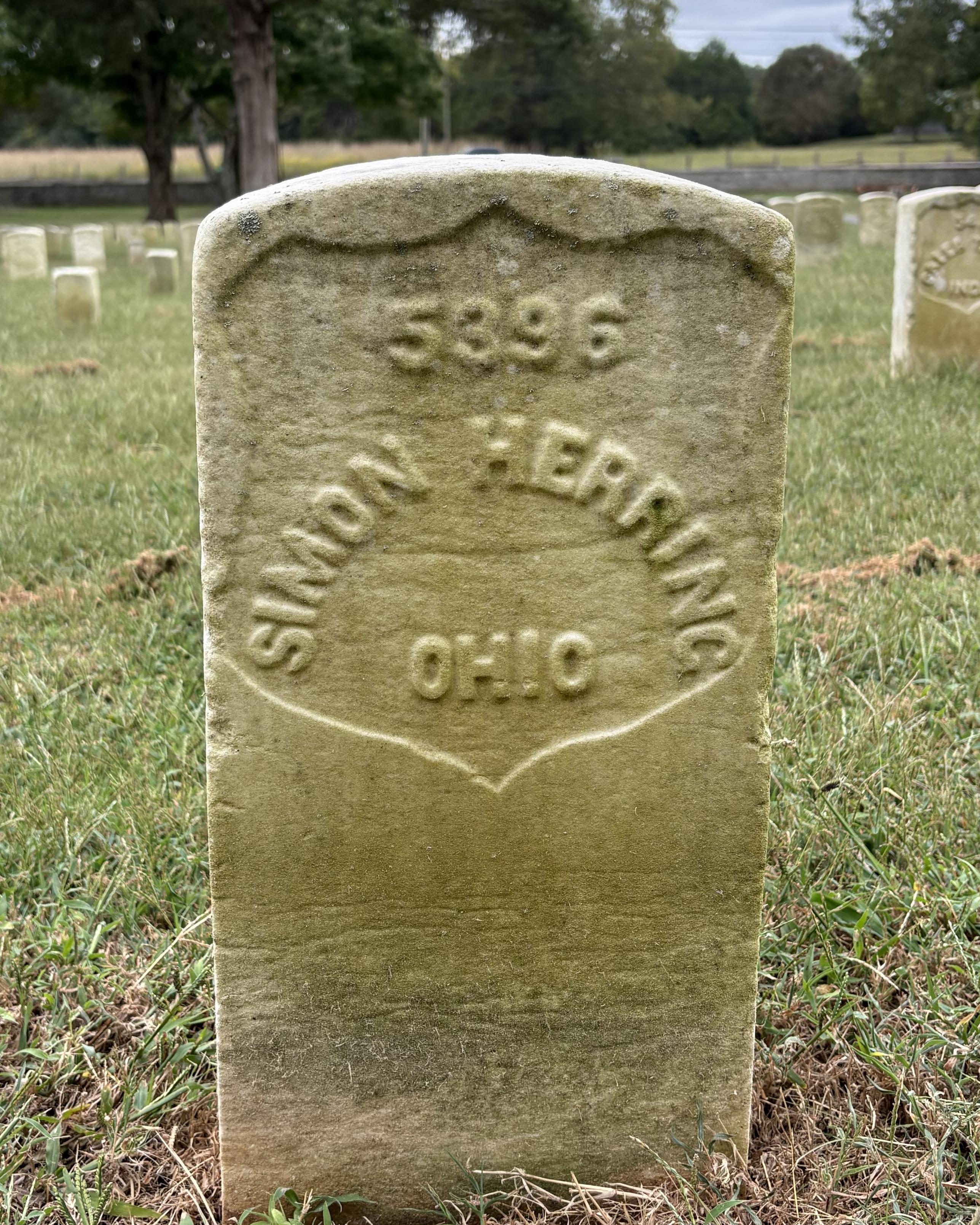 Marble headstone belonging to Civil War veteran Simon Herring.