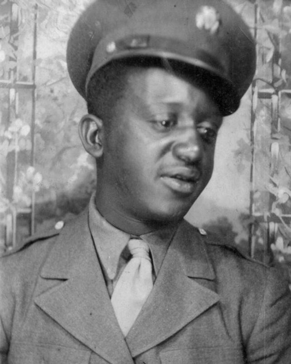Black and white photo of African American man in World War 2 uniform.