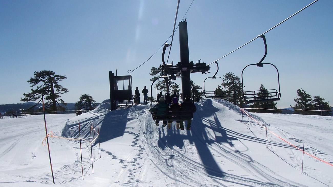 Ski lift at Badger Pass with snow on the ground