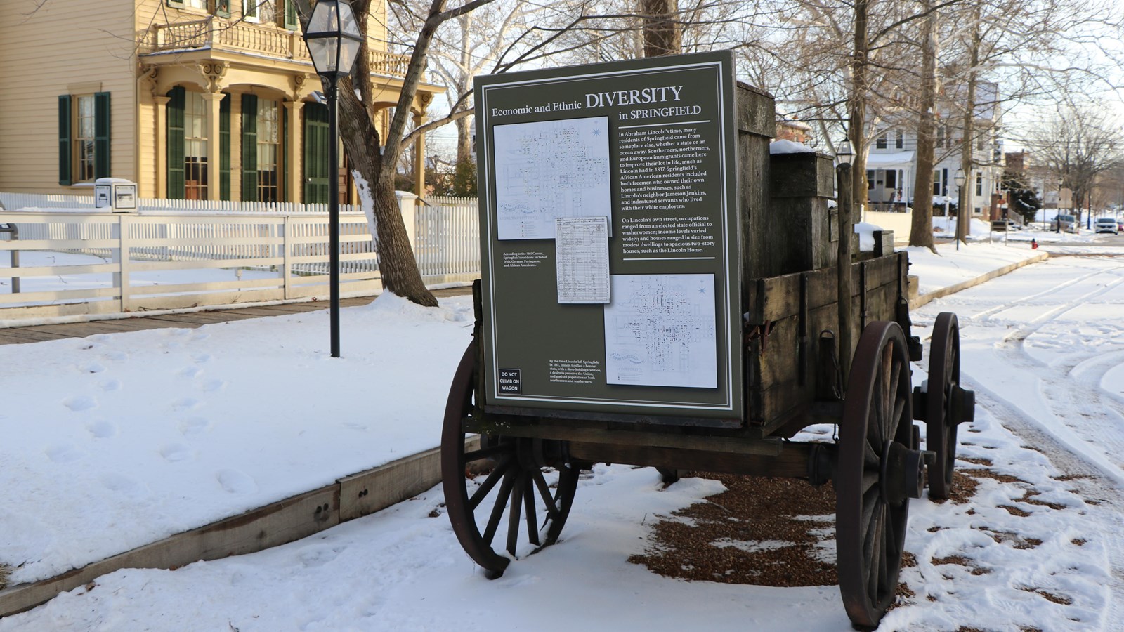Outdoor wayside exhibit on replica wagon