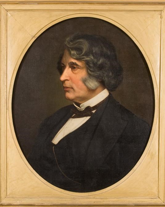 Painting of man in suit with graying hair and sideburns in 3/4 profile, in gold frame.
