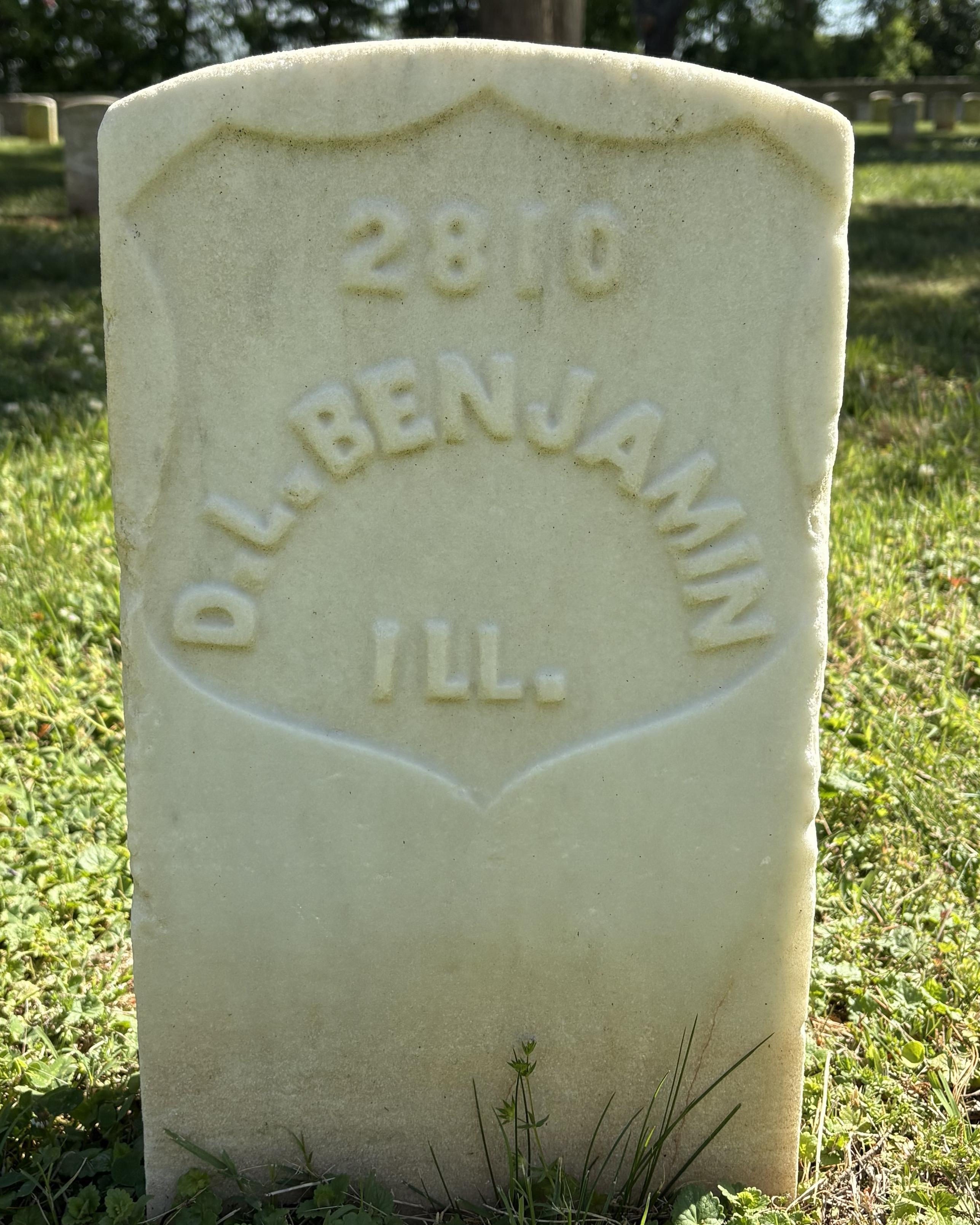 Marble headstone belonging to Civil War soldier David L Benjamin. 