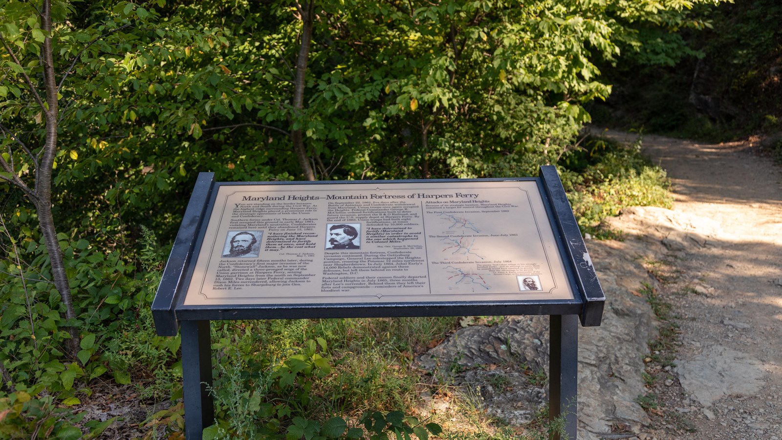 A sign on the side of a rocky, uphill trail describes the strategic location of Maryland Heights