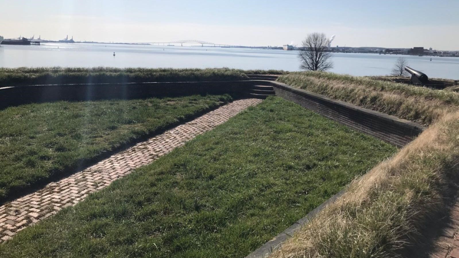 A view of bastion 4 looking out towards the Patapsco River on a sunny day.