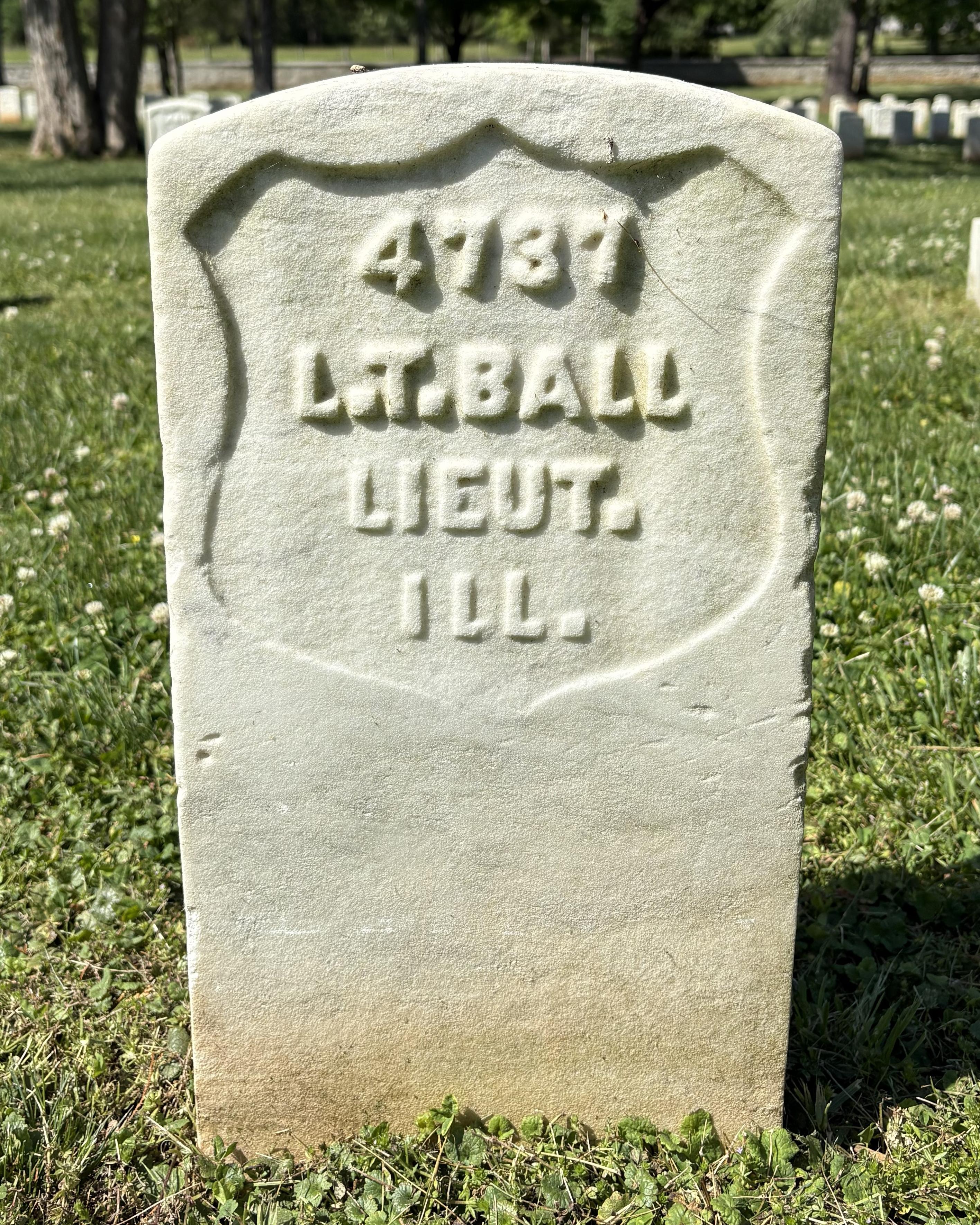 Marble headstone belonging to Union soldier Luther T Ball. 