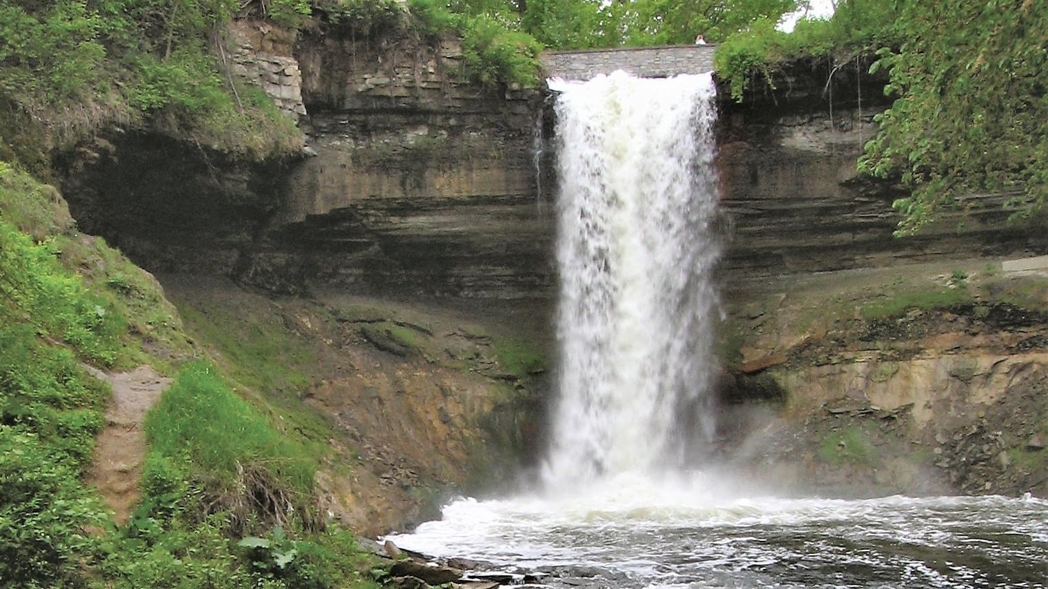A waterfall along a hiking trail.  