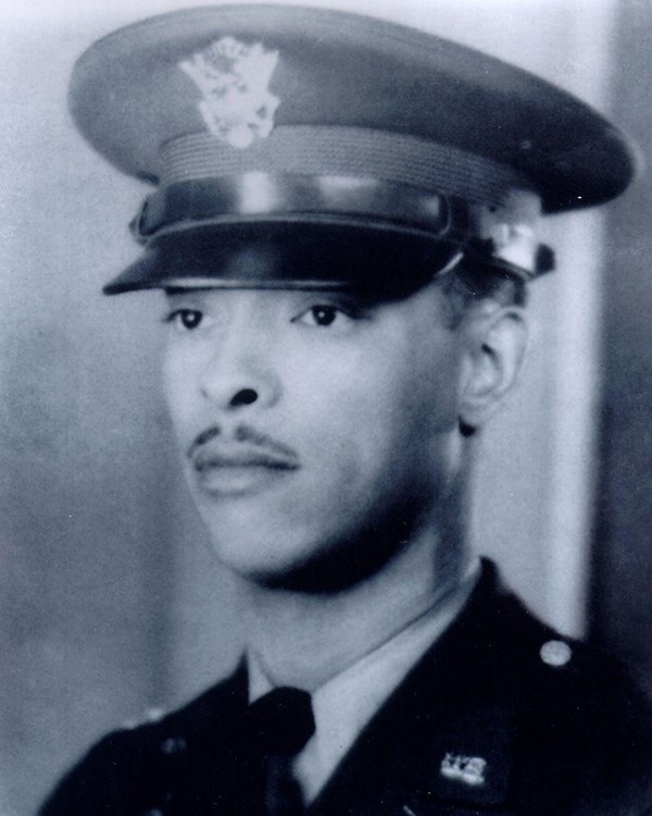 Black and white photo of African American man in ww2 dress uniform.