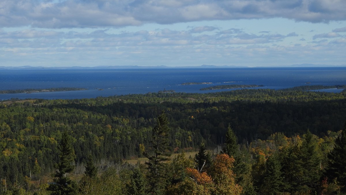 View from a ridge top. Lake Superior and the Canadian Shoreline can be seen in the distance. 