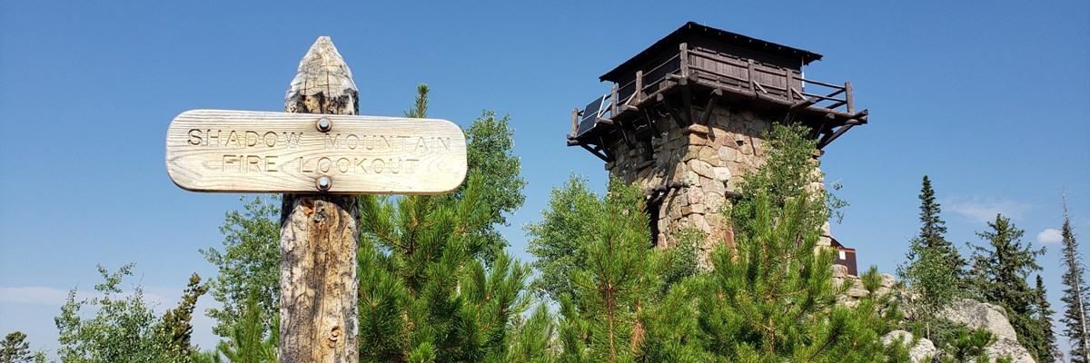 a sign reads shadow mountain lookout