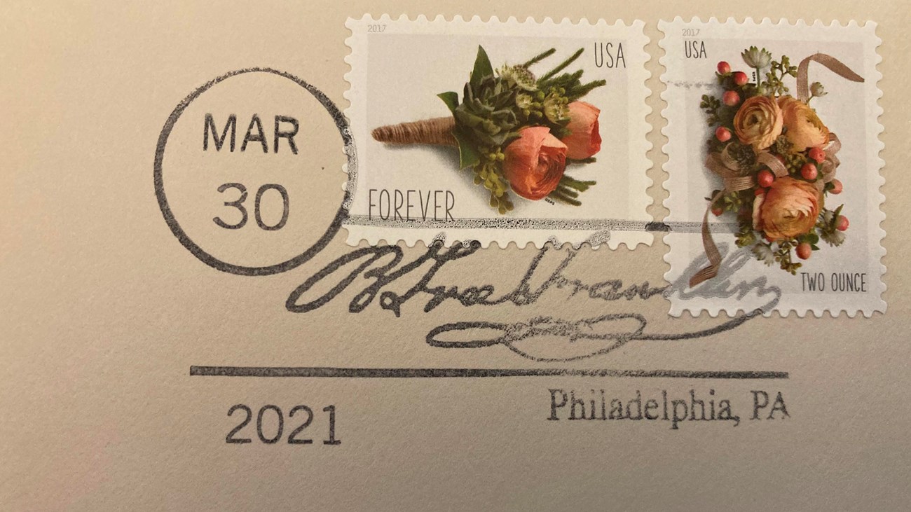 Detail of corner of envelope with the words