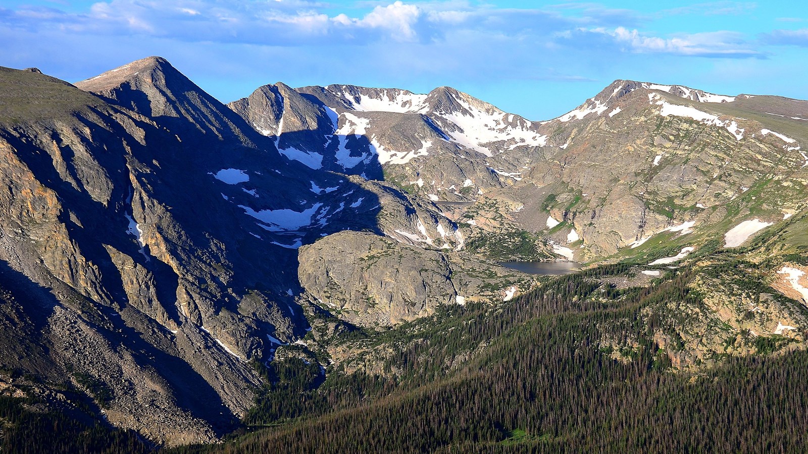 snow patched mountains