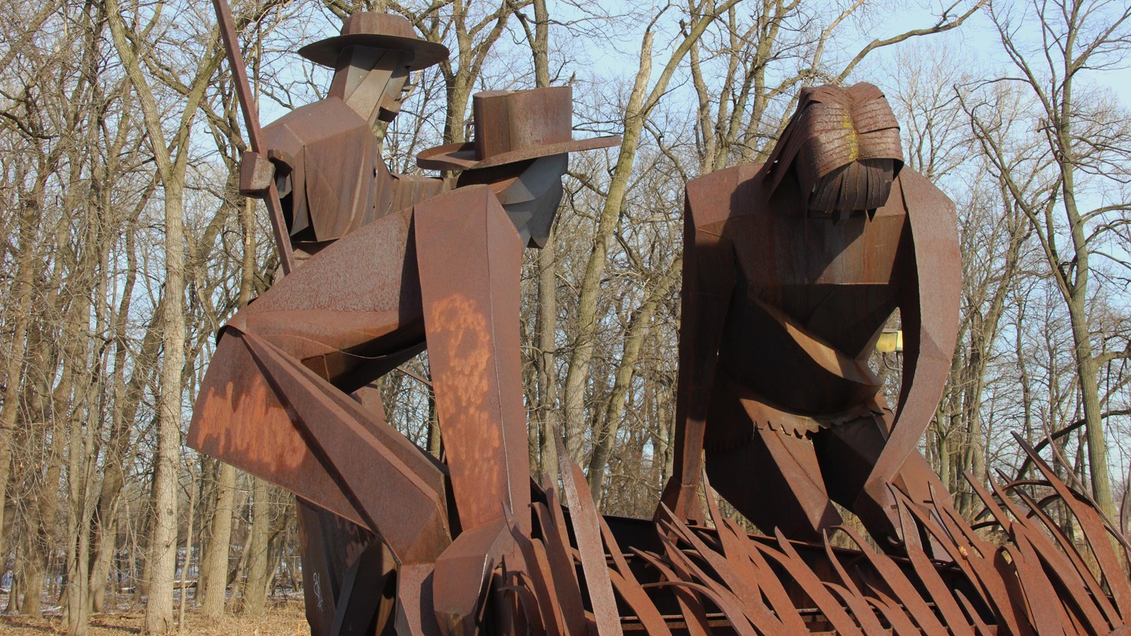 Fr. Jacques Marquette, Louis Joliet, and a Native-American near a canoe