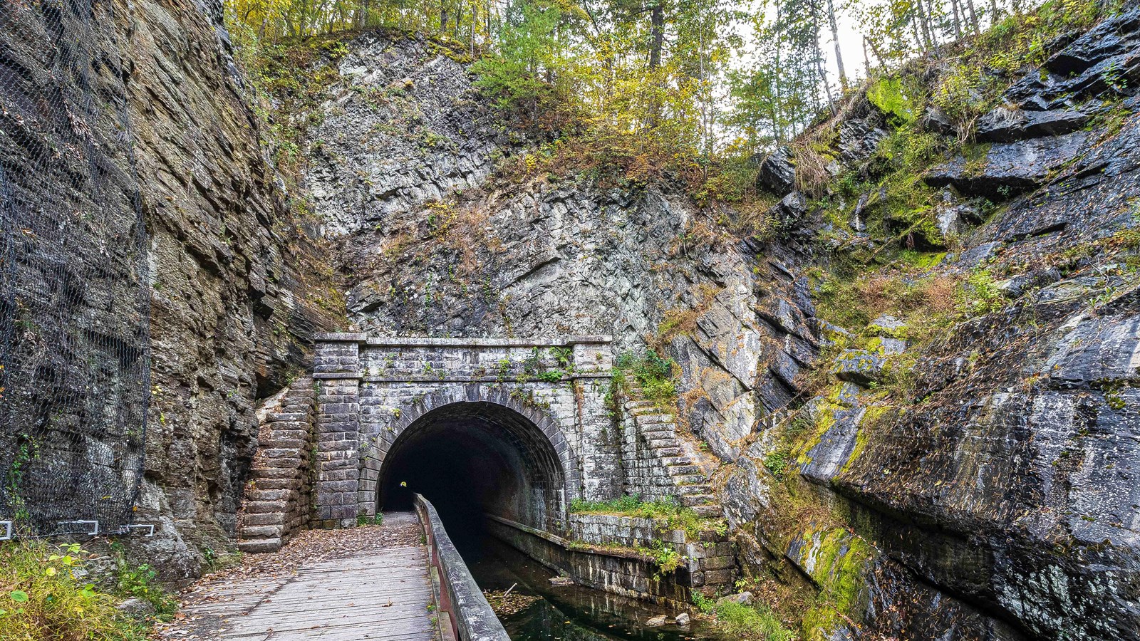 The mouth a Paw Paw Tunnel built into a rock wall.