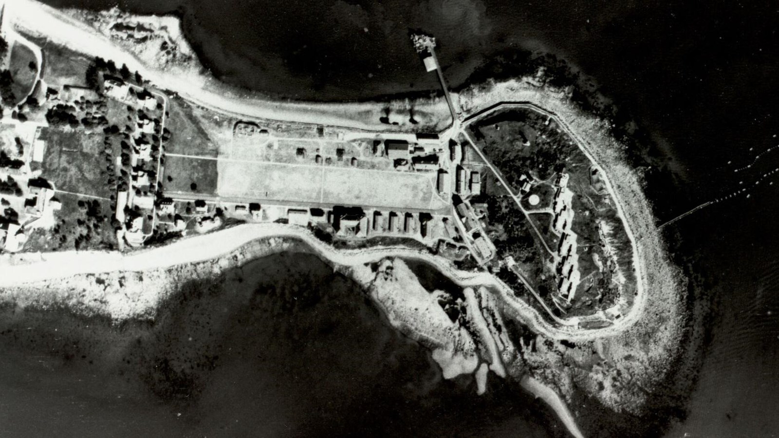 aerial view of part of an island that shows buildings and defenses that belong to Fort Strong