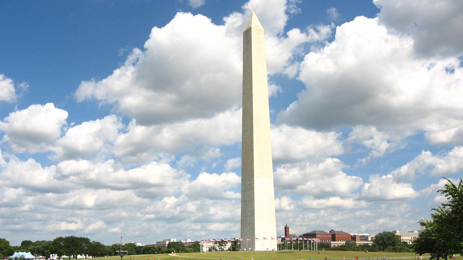 A tall, white stone obelisk