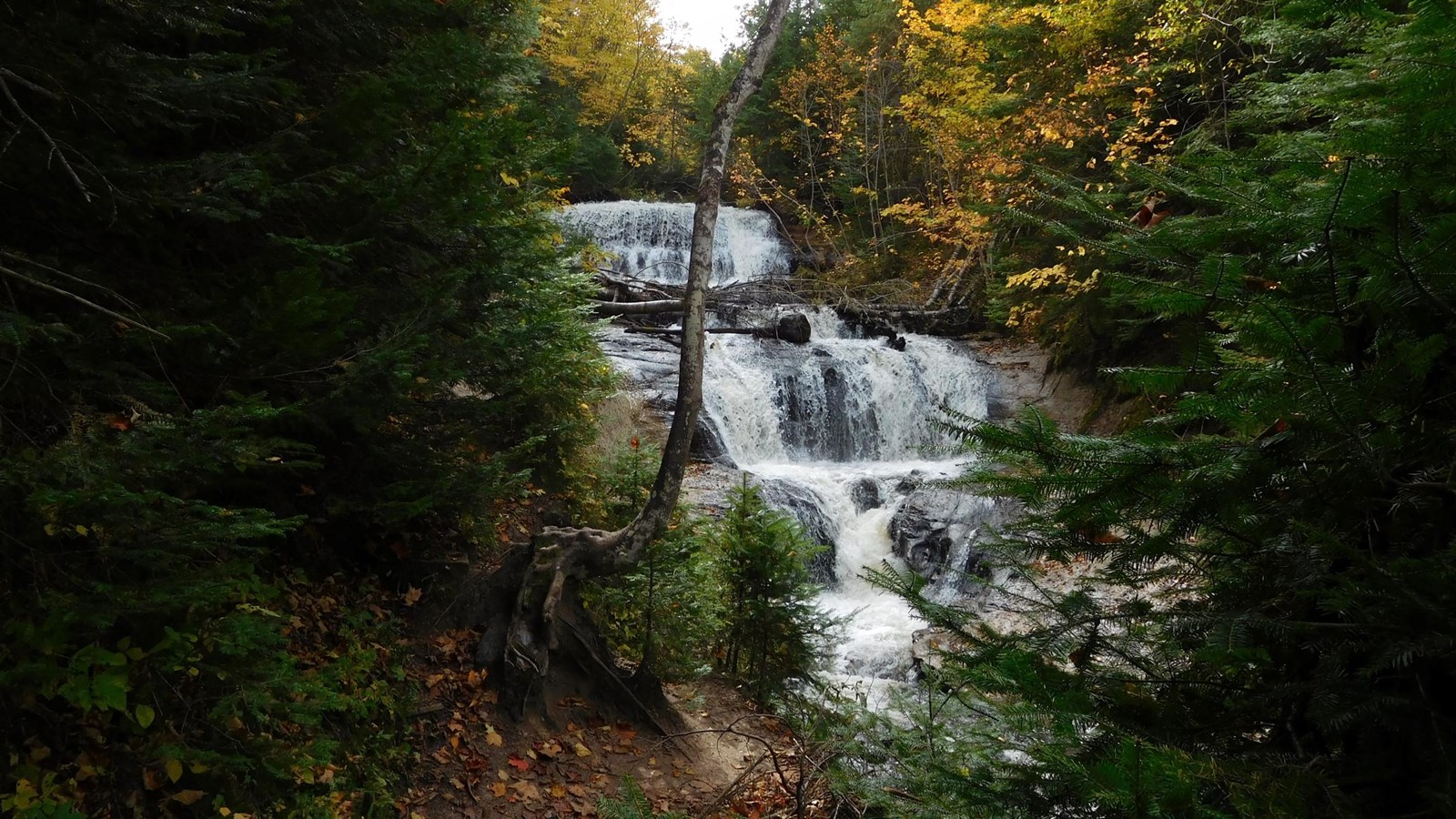 Sable Falls in Fall tumbles 75 feet over a cascading slope of sandstone rock